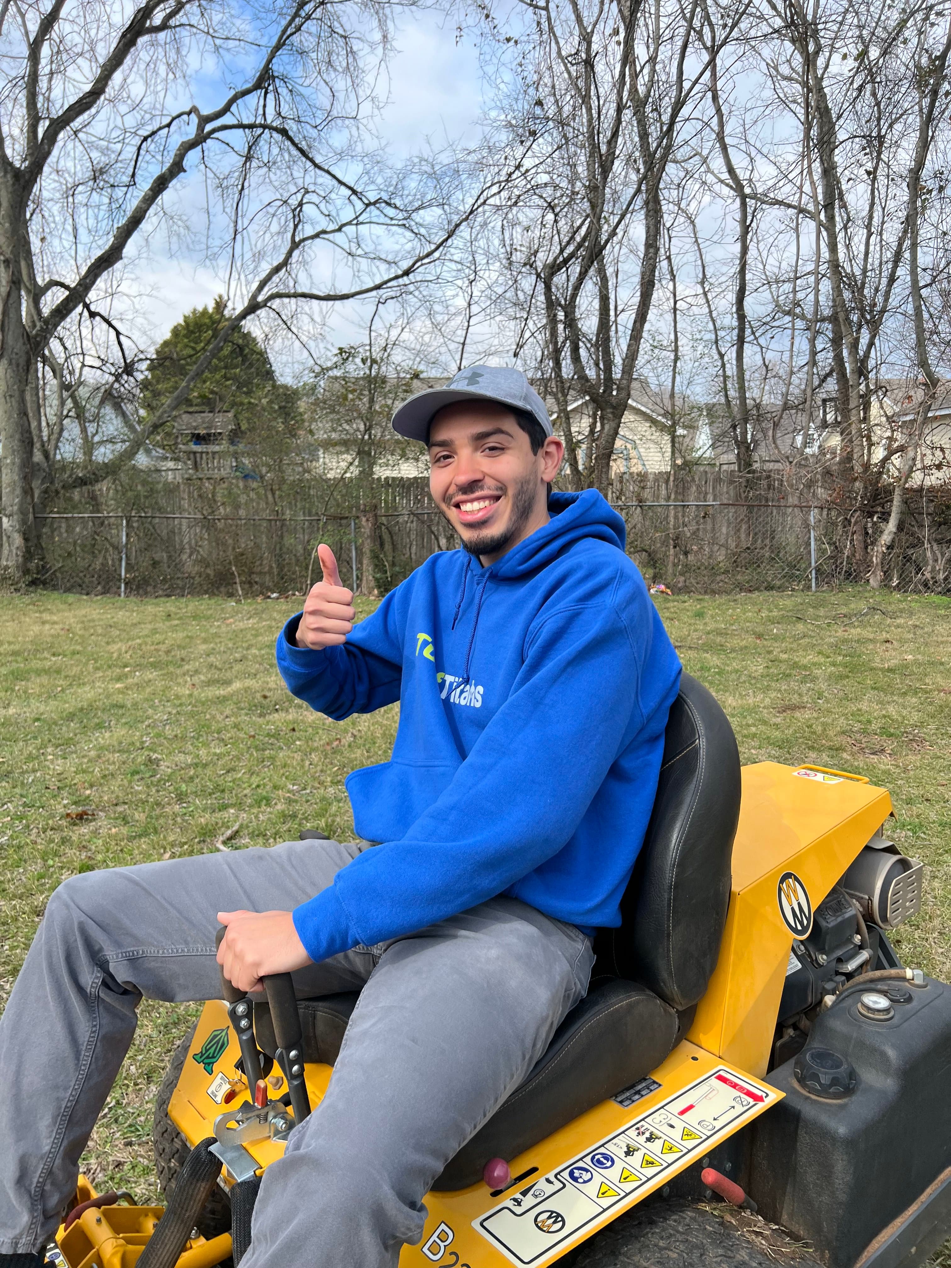 Martin Guzman, founder and owner of Turf Titans lawn care in Huntsville, AL